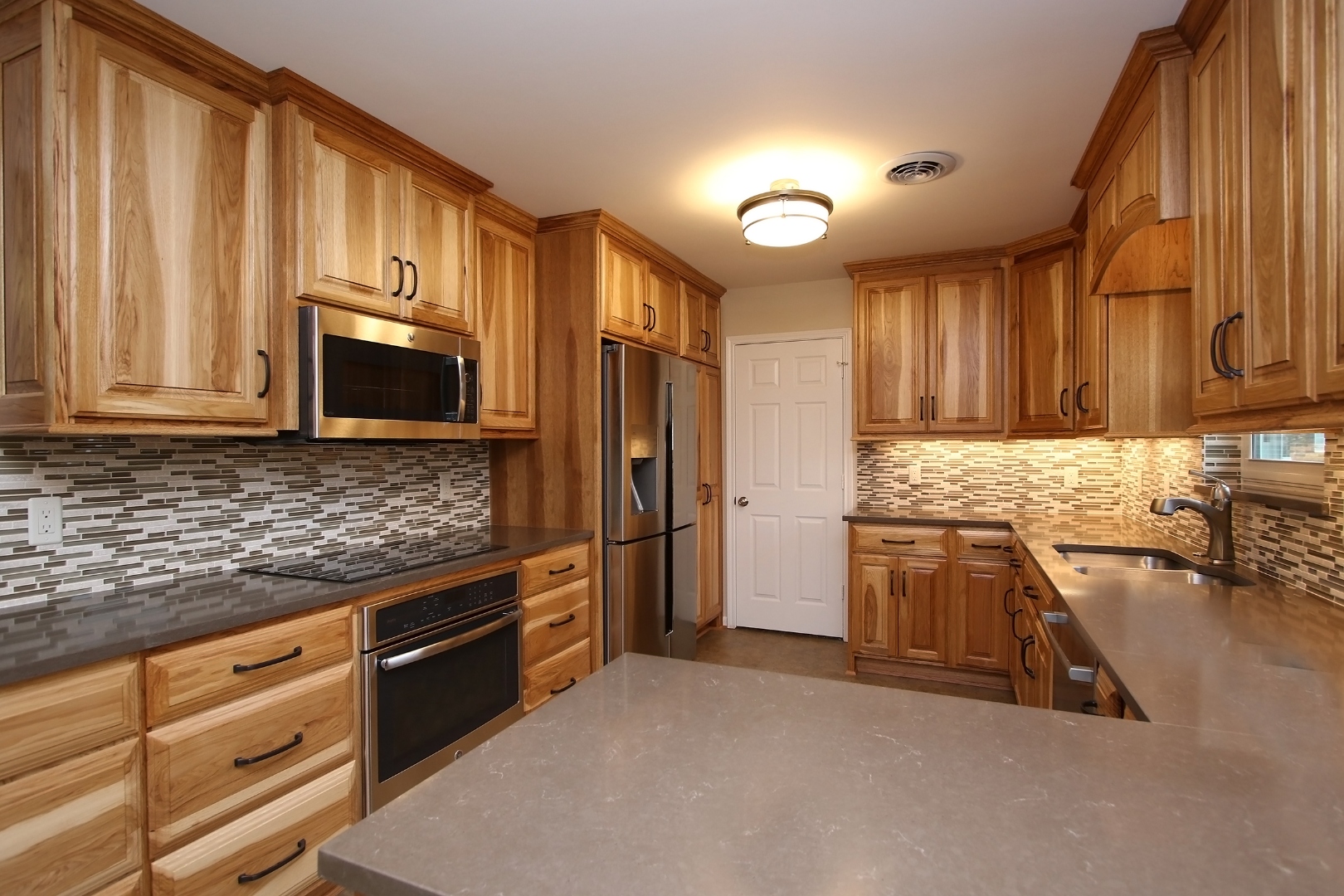Custom kitchen cabinetry solid wood traditional finish