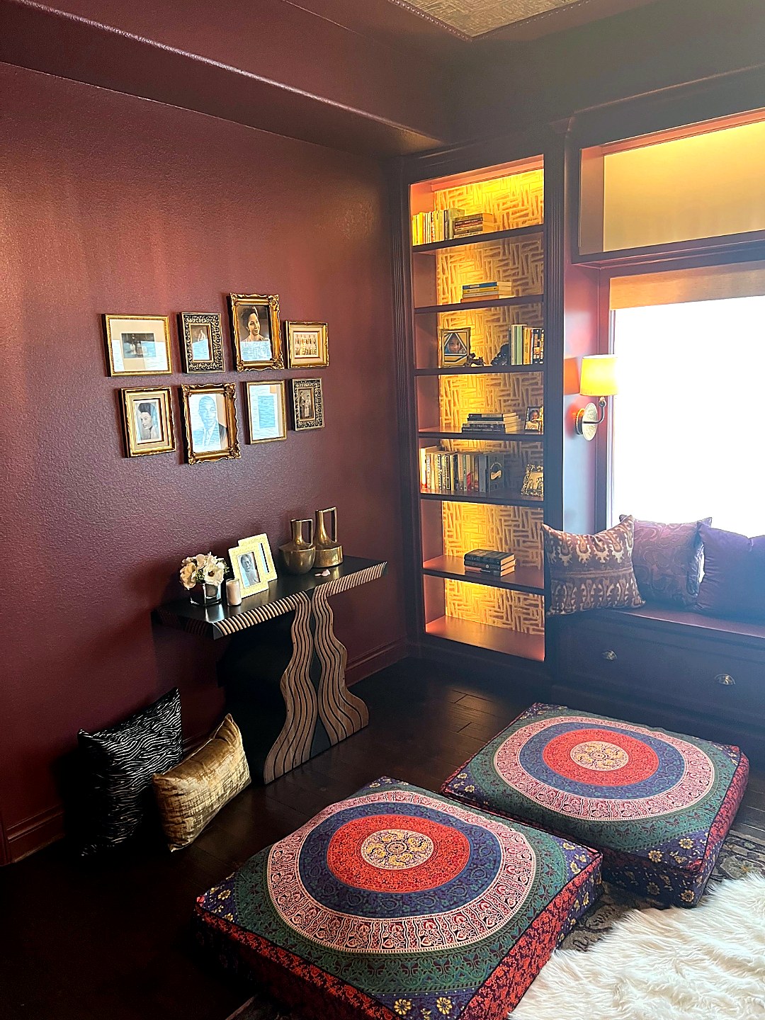 Custom lit bookcase and built-in display shelving
