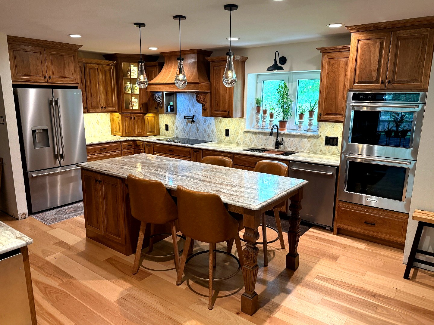 Traditional cherry kitchen with granite island and double ovens